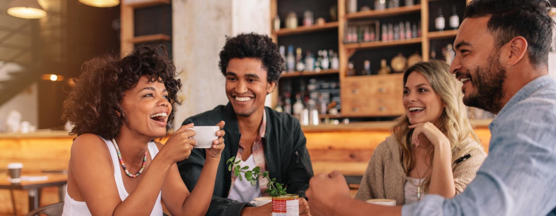 a group of people sitting at a table